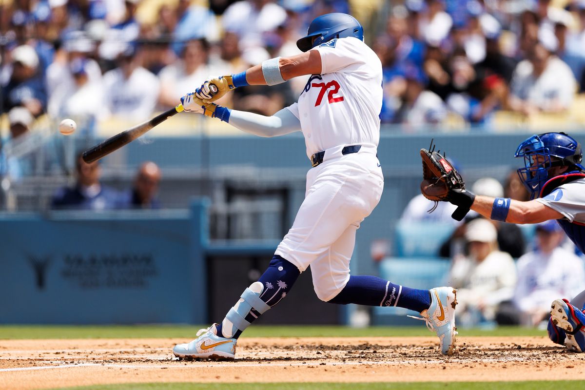 Miguel Rojas #72 of the Los Angeles Dodgers hits during the game against the Chicago Cubs at Dodger Stadium on April 26, 2026 in Los Angeles, California. 