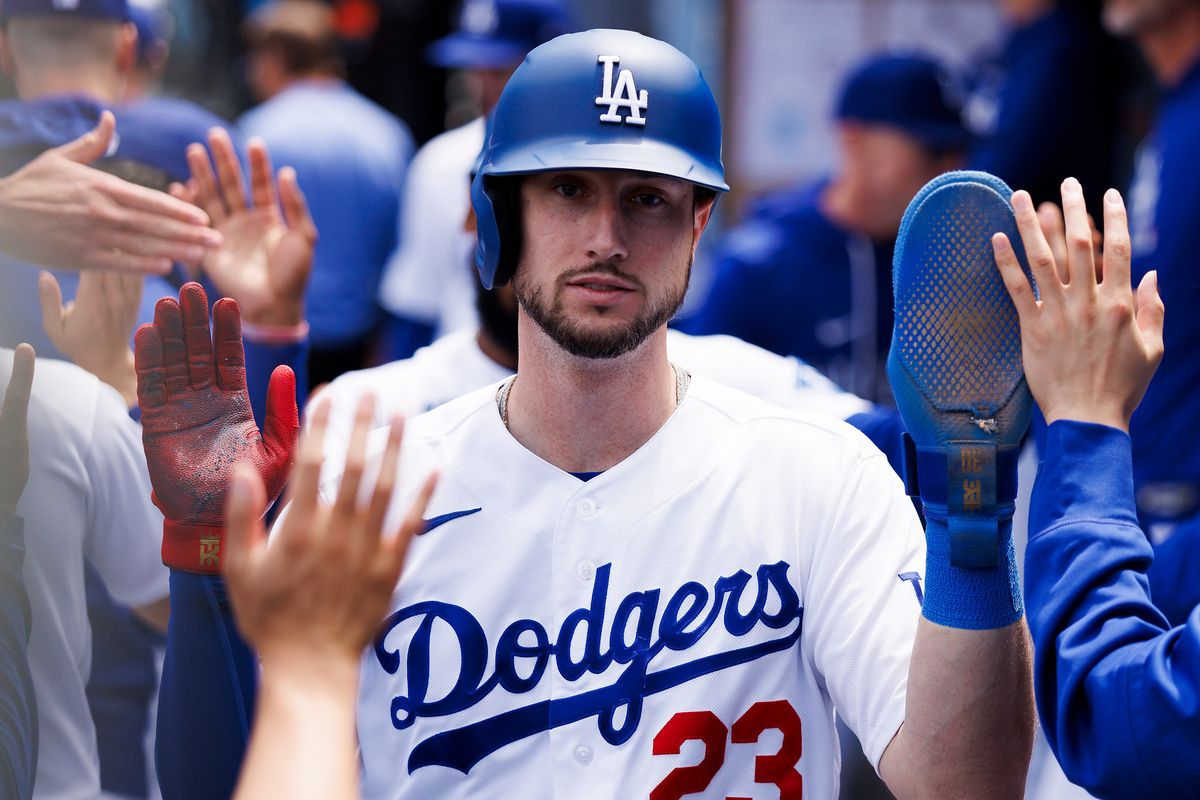Kyle Tucker #23 of the Los Angeles Dodgers celebrates in the dugout during the game against the Chicago Cubs at Dodger Stadium on April 26, 2026 in Los Angeles, California. 