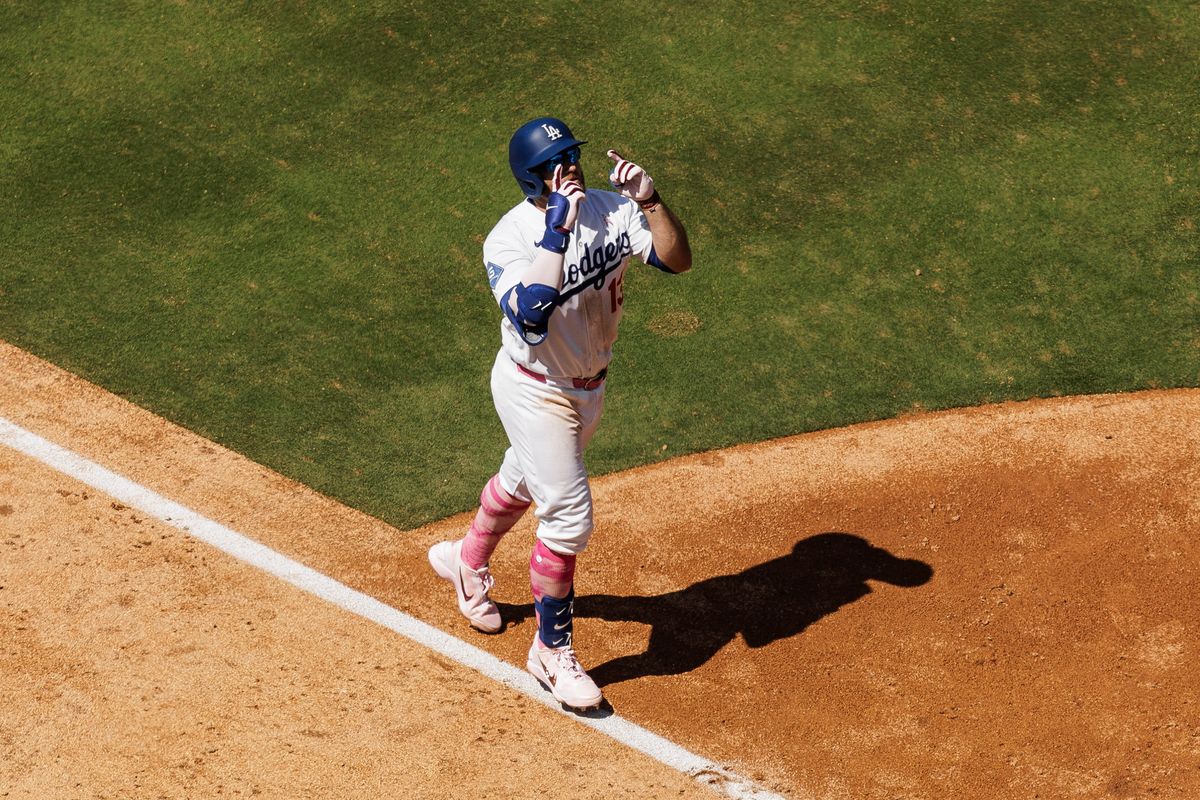 Los Angeles Dodgers third baseman Max Muncy (13) celebrates hitting a home-run during an MLB game against the Atlanta Braves on May 10, 2026 in Los Angeles, CA.