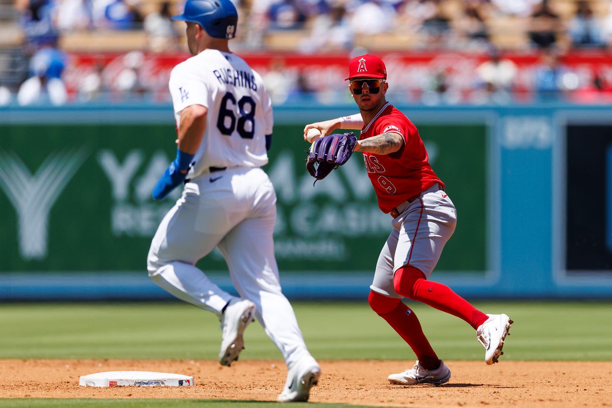 Zach Neto #9 of the Los Angeles Angels throws during the game against the Los Angeles Angels at Dodger Stadium on June 7, 2026 in Los Angeles, California. Zach Neto #9 of the Los Angeles Angels throws during the game against the Los Angeles Angels at Dodger Stadium on June 7, 2026 in Los Angeles, California.