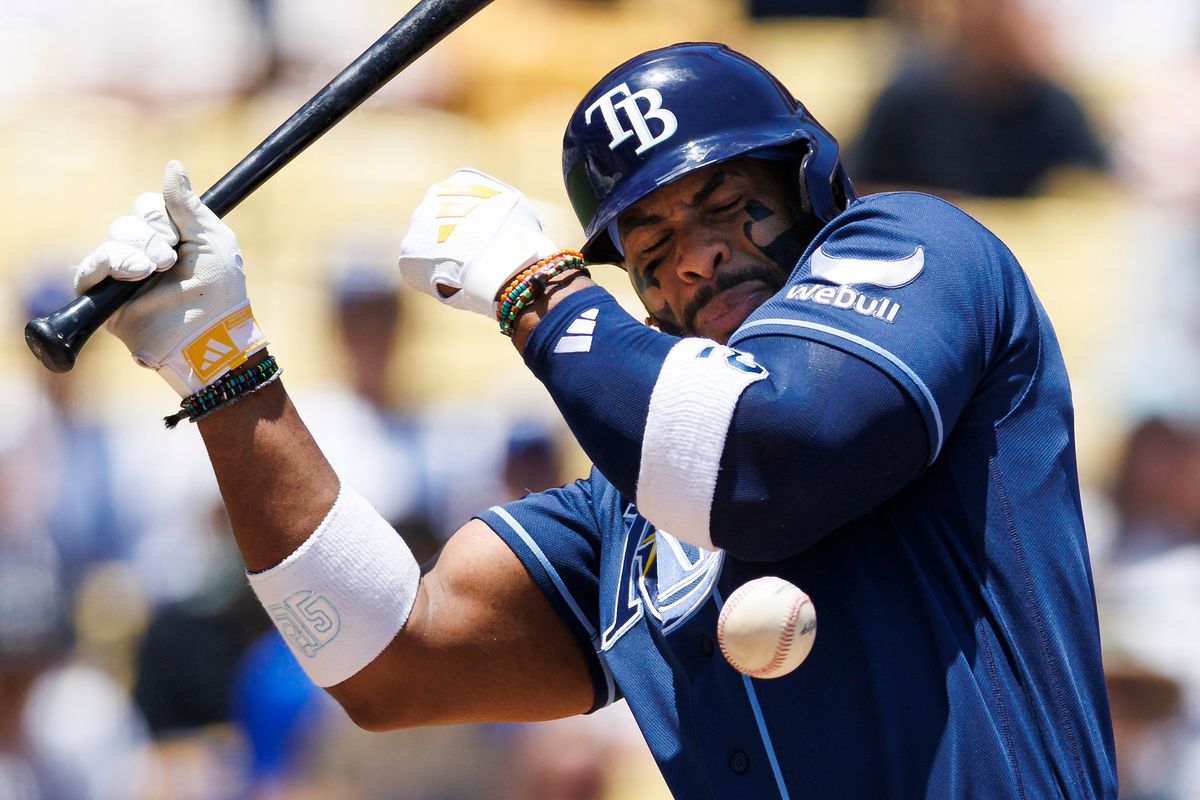 Yandy Diaz #2 of the Tampa Bay Rays avoids being hit by pitch during the game against the Los Angeles Dodgers at Dodger Stadium on June 17, 2026 in Los Angeles, California. Yandy Diaz #2 of the Tampa Bay Rays avoids being hit by pitch during the game against the Los Angeles Dodgers at Dodger Stadium on June 17, 2026 in Los Angeles, California.