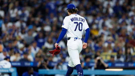  Justin Wrobleski #70 of the Los Angeles Dodgers walk off the field during the game against the Washington Nationals at Dodger Stadium on September 6, 2026 in Los Angeles, California. 