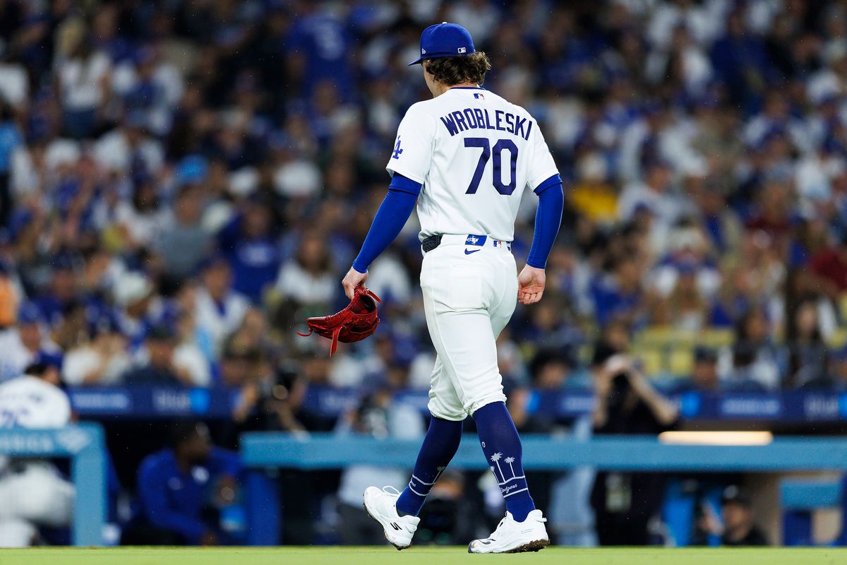 Justin Wrobleski #70 of the Los Angeles Dodgers walk off the field during the game against the Washington Nationals at Dodger Stadium on September 6, 2026 in Los Angeles, California. Justin Wrobleski #70 of the Los Angeles Dodgers walk off the field during the game against the Washington Nationals at Dodger Stadium on September 6, 2026 in Los Angeles, California.