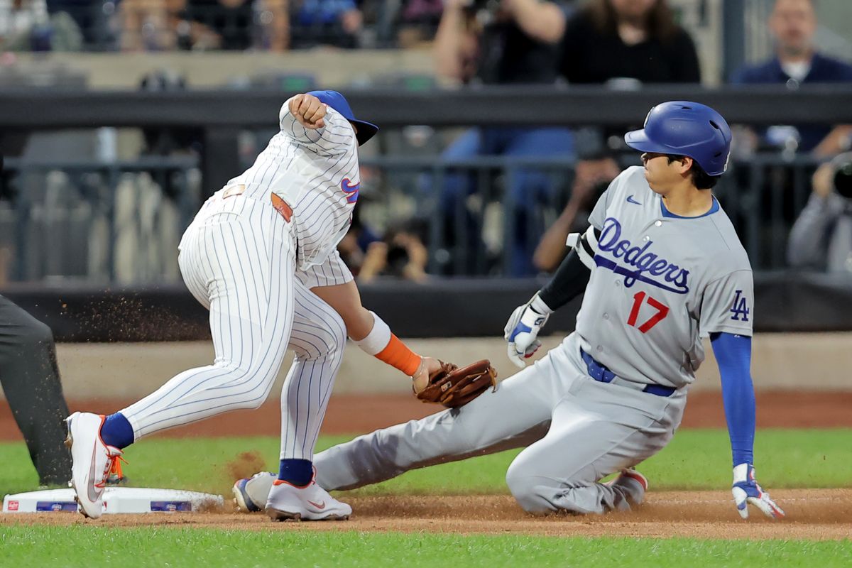 Jul 24, 2026; New York City, New York, USA; Los Angeles Dodgers designated hitter Shohei Ohtani (17) is tagged out at third base by New York Mets third baseman Bo Bichette (19) attempting to stretch a double into a triple during the fifth inning at Citi Field. Mandatory Credit: Brad Penner-Imagn Images Jul 24, 2026; New York City, New York, USA; Los Angeles Dodgers designated hitter Shohei Ohtani (17) is tagged out at third base by New York Mets third baseman Bo Bichette (19) attempting to stretch a double into a triple during the fifth inning at Citi Field. Mandatory Credit: Brad Penner-Imagn Images