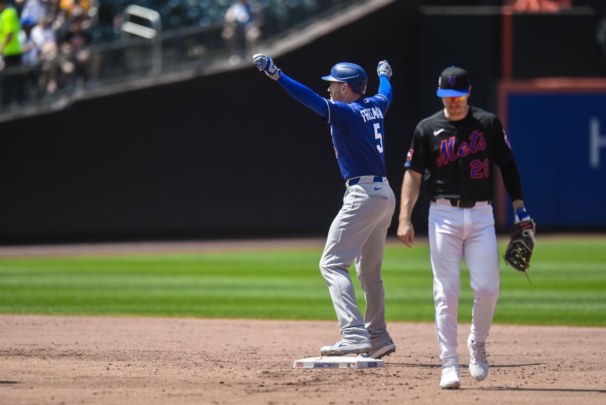 Jul 26, 2026; New York City, New York, USA; Los Angeles Dodgers first baseman Freddie Freeman (5) reacts after hitting a RBI double against the New York Mets during the third inning at Citi Field. Mandatory Credit: John Jones-Imagn Images Jul 26, 2026; New York City, New York, USA; Los Angeles Dodgers first baseman Freddie Freeman (5) reacts after hitting a RBI double against the New York Mets during the third inning at Citi Field. Mandatory Credit: John Jones-Imagn Images