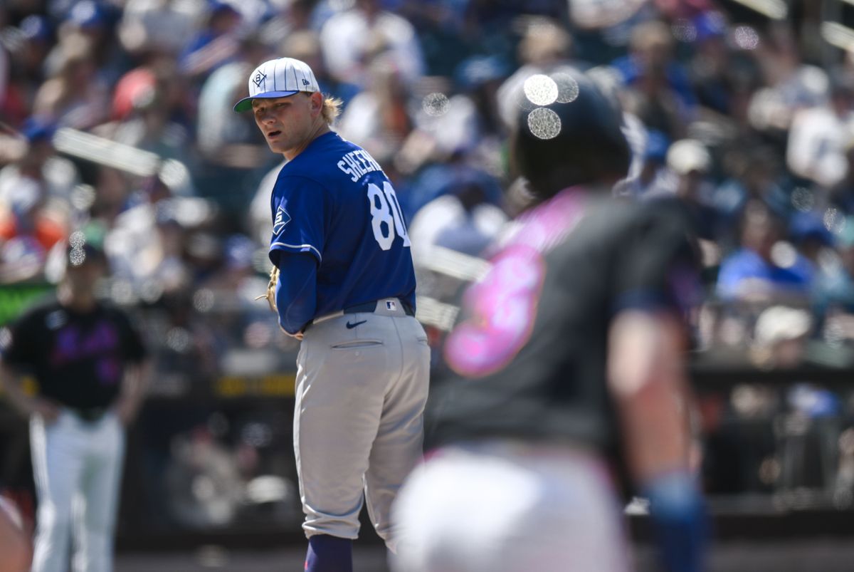 Jul 26, 2026; New York City, New York, USA; Los Angeles Dodgers pitcher Emmet Sheehan (80) keeps an eye on New York Mets right fielder Carson Benge (3) at first base during the third inning at Citi Field. Mandatory Credit: John Jones-Imagn Images Jul 26, 2026; New York City, New York, USA; Los Angeles Dodgers pitcher Emmet Sheehan (80) keeps an eye on New York Mets right fielder Carson Benge (3) at first base during the third inning at Citi Field. Mandatory Credit: John Jones-Imagn Images