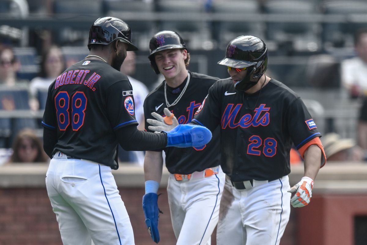 Jul 26, 2026; New York City, New York, USA; New York Mets center fielder Tyrone Taylor (28) celebrates with center fielder Luis Robert Jr. (88) and right fielder Carson Benge (3) after hitting a three-run home run against the Los Angeles Dodgers during the sixth inning at Citi Field. Mandatory Credit: John Jones-Imagn Images Jul 26, 2026; New York City, New York, USA; New York Mets center fielder Tyrone Taylor (28) celebrates with center fielder Luis Robert Jr. (88) and right fielder Carson Benge (3) after hitting a three-run home run against the Los Angeles Dodgers during the sixth inning at Citi Field. Mandatory Credit: John Jones-Imagn Images