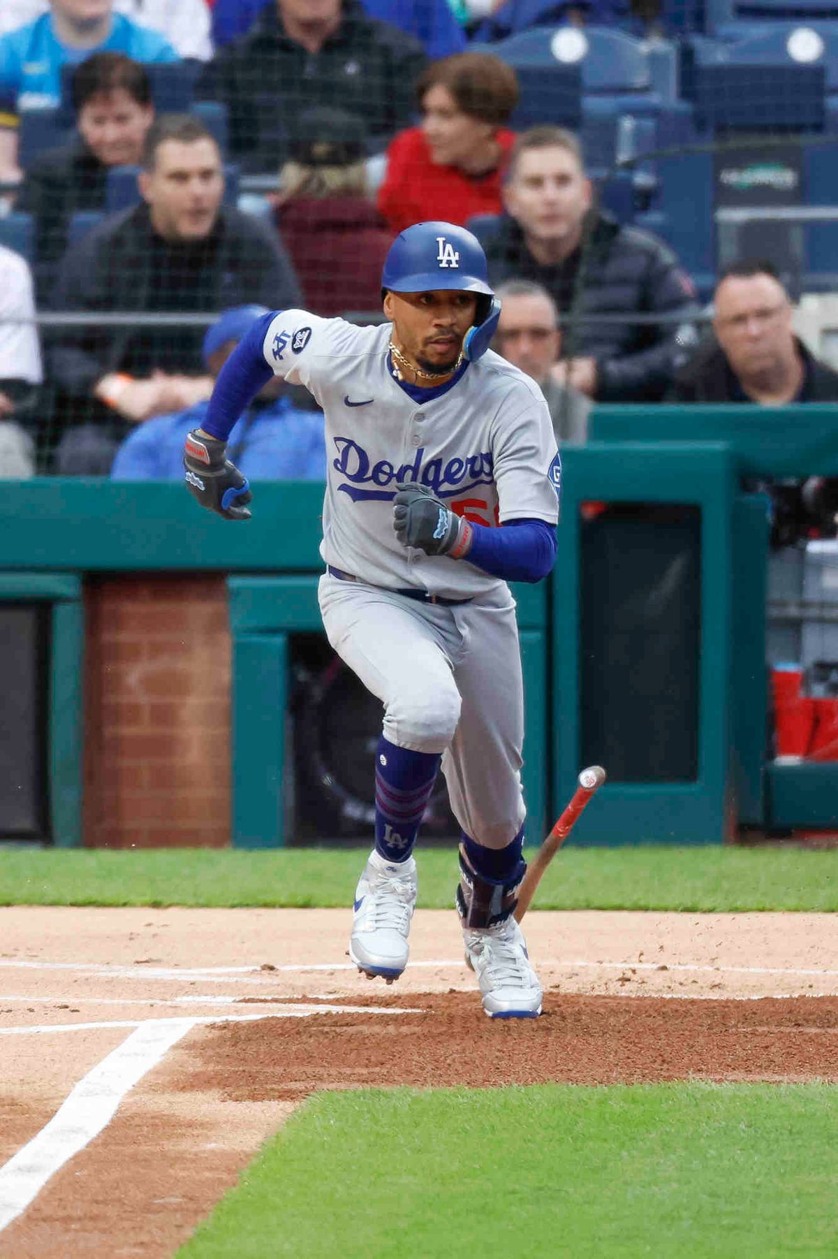 Mookie Betts #50 of the Los Angeles Dodgers runs up the line in the first inning during a game against the Philadelphia Phillies at Citizens Bank Park on April 5, 2025 in Philadelphia, Pennsylvania.