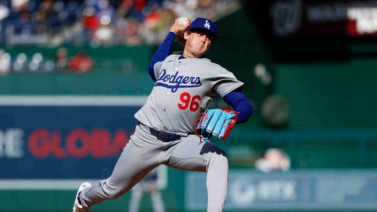Landon Knack #96 of the Los Angeles Dodgers throws a pitch during a game against the Washington Nationals at Nationals Park on April 09, 2025 in Washington, DC.