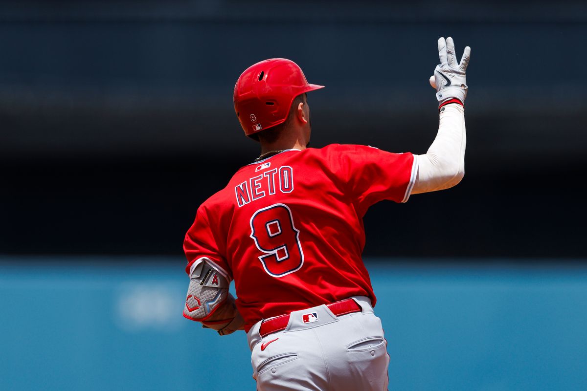 Zach Neto #9 of the Los Angeles Angels celebrates his home run during the game against the Los Angeles Dodgers at Dodger Stadium on May 18, 2025 in Los Angeles, California.