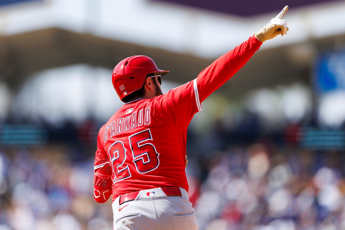 Travis d'Arnaud #25 of the Los Angeles Angels celebrates his hone run during the game against the Los Angeles Dodgers at Dodger Stadium on May 18, 2025 in Los Angeles, California.