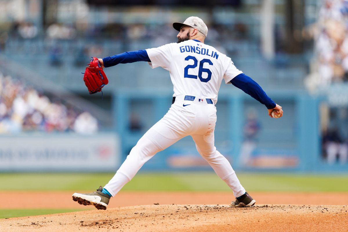 Tony Gonsolin #26 of the Los Angeles Dodgers pitches during the game against the Los Angeles Angels at Dodger Stadium on May 18, 2025 in Los Angeles, California. 