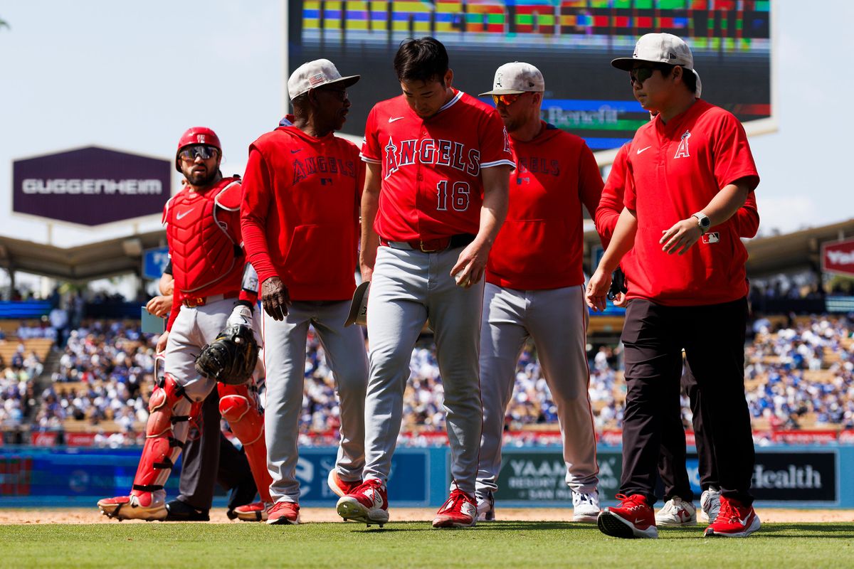 Yusei Kikuchi #16 of the Los Angeles Angels walks off the field during the game against the Los Angeles Dodgers at Dodger Stadium on May 18, 2025 in Los Angeles, California.