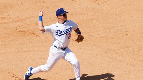 Tommy Edman #25 of the Los Angeles Dodgers throws during the game against the Milwaukee Brewers at Dodger Stadium on July 20, 2025 in Los Angeles, California. Tommy Edman #25 of the Los Angeles Dodgers throws during the game against the Milwaukee Brewers at Dodger Stadium on July 20, 2025 in Los Angeles, California.