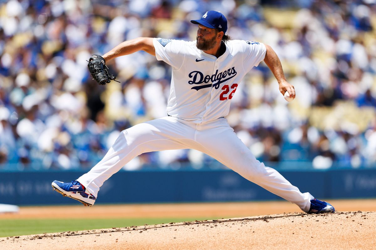 Clayton Kershaw #22 of the Los Angeles Dodgers pitches during the game against the Milwaukee Brewers at Dodger Stadium on July 20, 2025 in Los Angeles, California. 