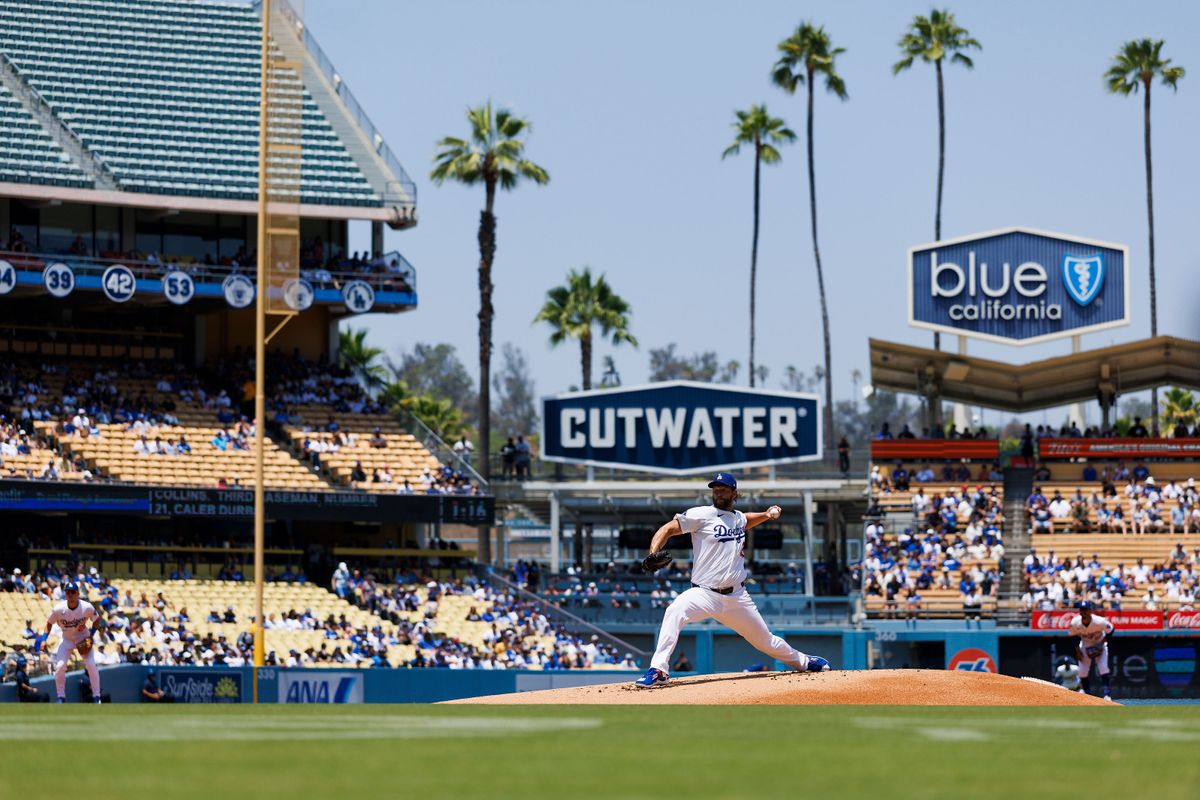 Clayton Kershaw #22 of the Los Angeles Dodgers pitches during the game against the Milwaukee Brewers at Dodger Stadium on July 20, 2025 in Los Angeles, California. 