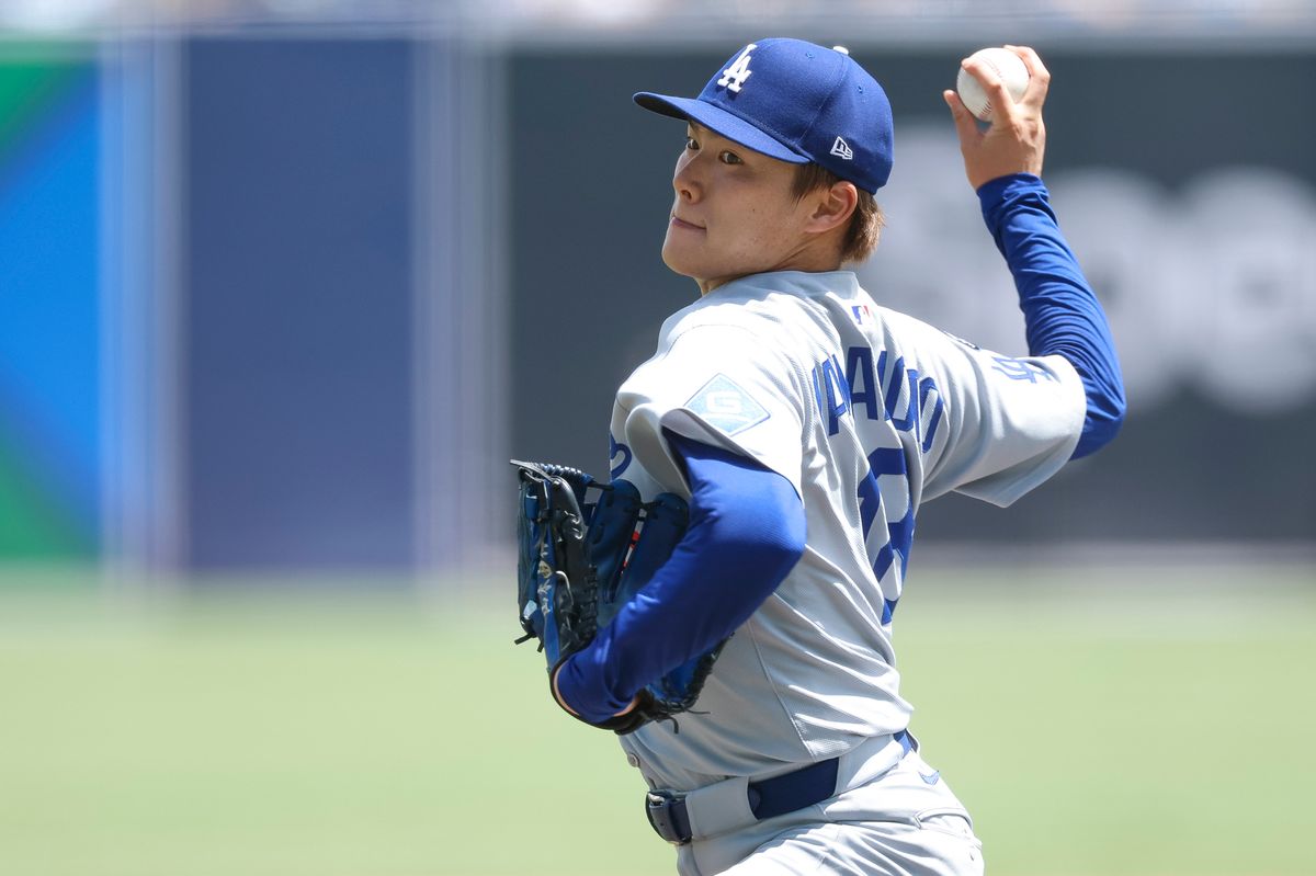 Yoshinobu Yamamoto #18 of the Los Angeles Dodgers pitches against the Tampa Bay Rays at George M. Steinbrenner Field on August 03, 2025 in Tampa, Florida.