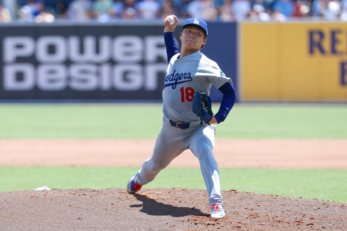 Yoshinobu Yamamoto #18 of the Los Angeles Dodgers pitches against the Tampa Bay Rays at George M. Steinbrenner Field on August 03, 2025 in Tampa, Florida.