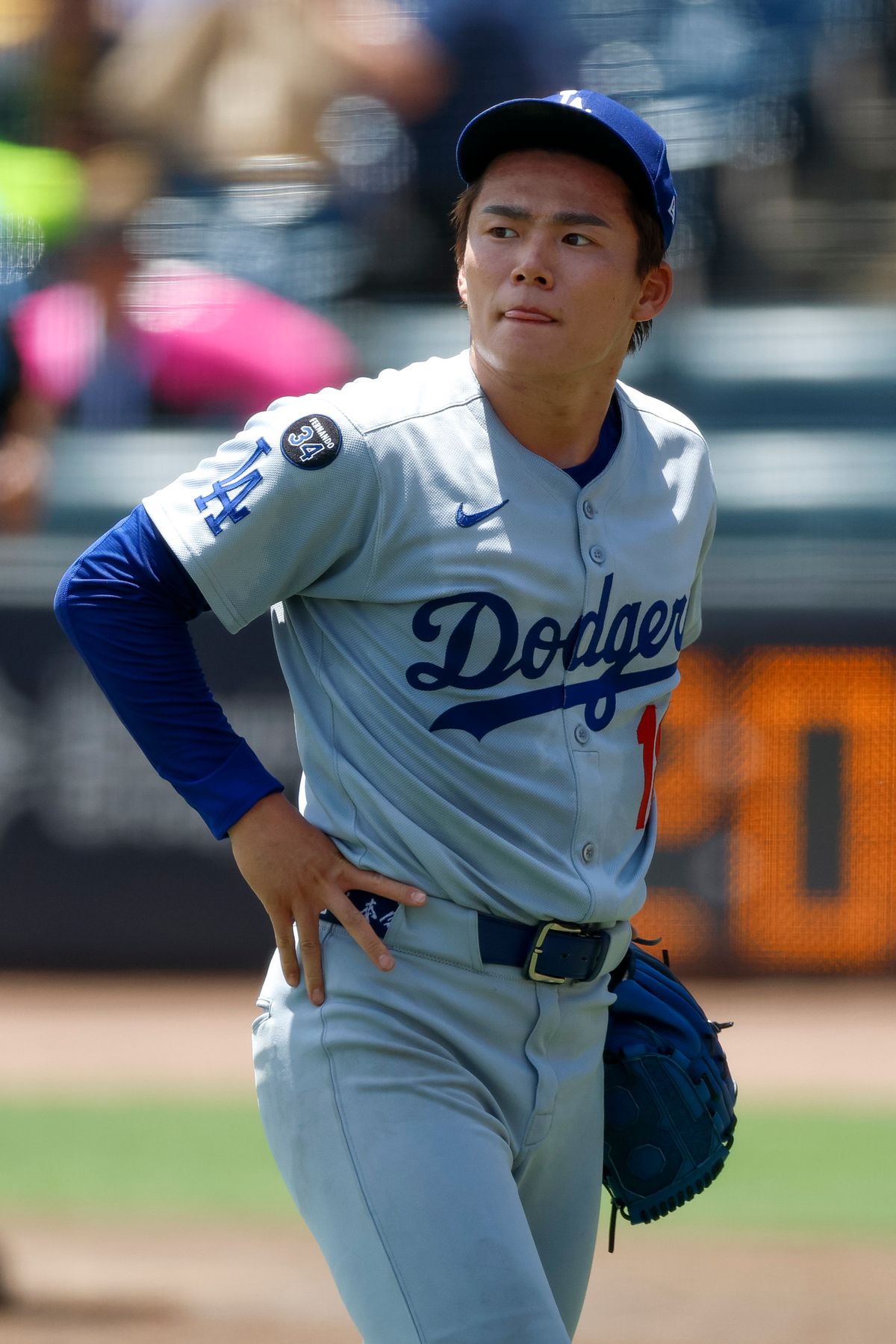 Yoshinobu Yamamoto #18 of the Los Angeles Dodgers walks to the dugout against the Tampa Bay Rays at George M. Steinbrenner Field on August 03, 2025 in Tampa, Florida.