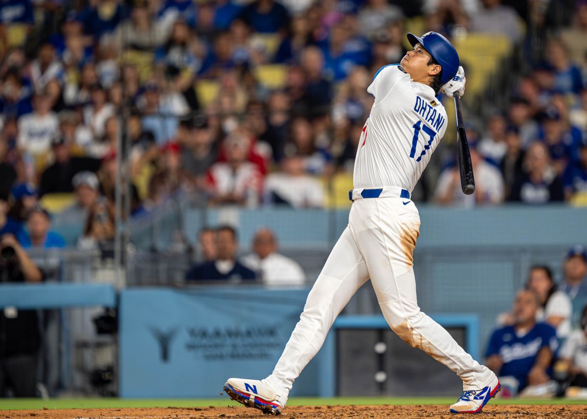 Los Angeles Dodgers pitcher, Shohei Ohtani 17, reacts to hitting a fly ball during an MLB baseball game against the Cincinnati Reds on August 26, 2025 in Los Angeles, CA.