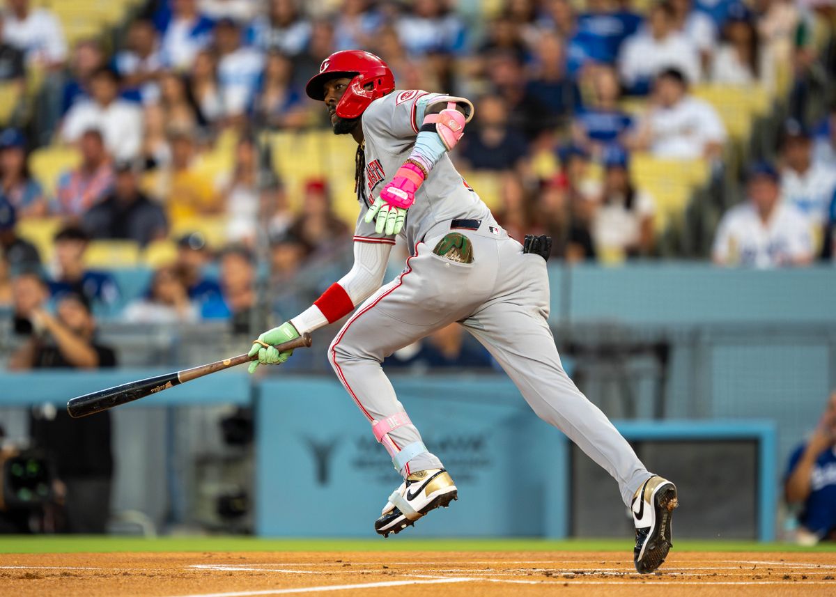 Cincinnati Red infielder, Elly De La Cruz 44, begins running toward first base after a hit during an MLB baseball game against the Cincinnati Reds on August 26, 2025 in Los Angeles, CA.