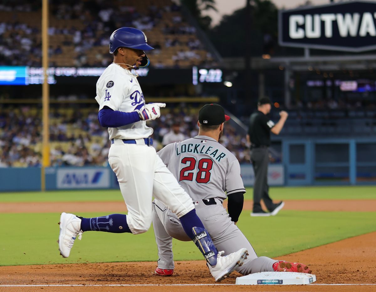 #50 Mookie Betts of the Los Angeles Dodgers attempts to make to first base during an MLB baseball game against the Arizona Diamondbacks on August 29, 2025 in Los Angeles, CA. #50 Mookie Betts of the Los Angeles Dodgers attempts to make to first base during an MLB baseball game against the Arizona Diamondbacks on August 29, 2025 in Los Angeles, CA.
