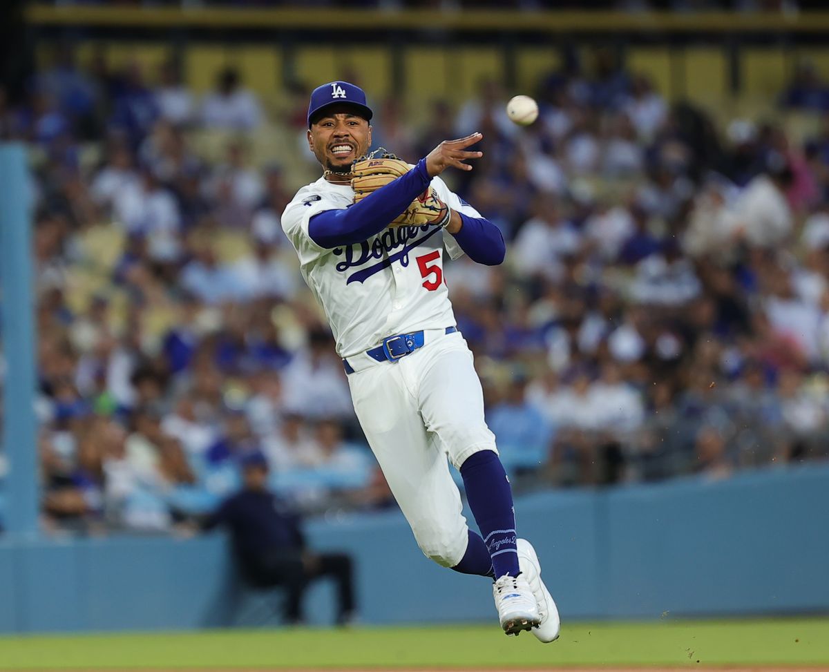 #50 Mookie Betts of the Los Angeles Dodgers throws to first base during an MLB baseball game against the Arizona Diamondbacks on August 29, 2025 in Los Angeles, CA. #50 Mookie Betts of the Los Angeles Dodgers throws to first base during an MLB baseball game against the Arizona Diamondbacks on August 29, 2025 in Los Angeles, CA.