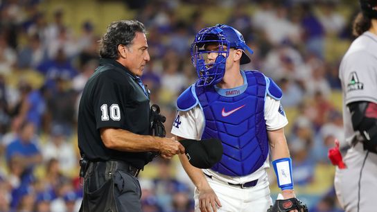 #16 Will Smith of the Los Angeles Dodgers talks an umpire during an MLB baseball game against the Arizona Diamondbacks on August 29, 2025 in Los Angeles, CA.