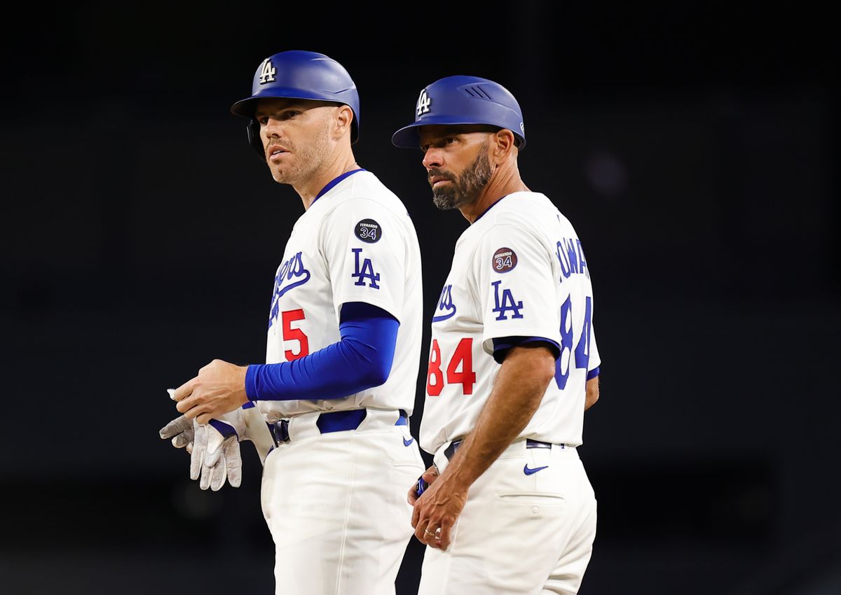 #5 Freddie Freeman and first base coach #84 Chris Woodward of the Los Angeles Dodgers survey the field during an MLB baseball game against the Arizona Diamondbacks on August 29, 2025 in Los Angeles, CA. #5 Freddie Freeman and first base coach #84 Chris Woodward of the Los Angeles Dodgers survey the field during an MLB baseball game against the Arizona Diamondbacks on August 29, 2025 in Los Angeles, CA.