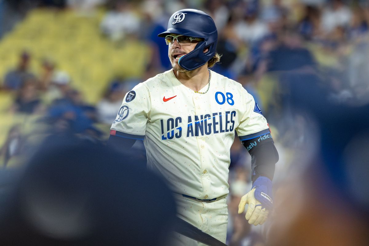 Enrique Hernández #8 of the Los Angeles Dodgers shows his frustration after striking out in the bottom of the ninth inning during an MLB game against the Arizona Diamondbacks at Dodger Stadium on August 30, 2025 in Los Angeles, California. 