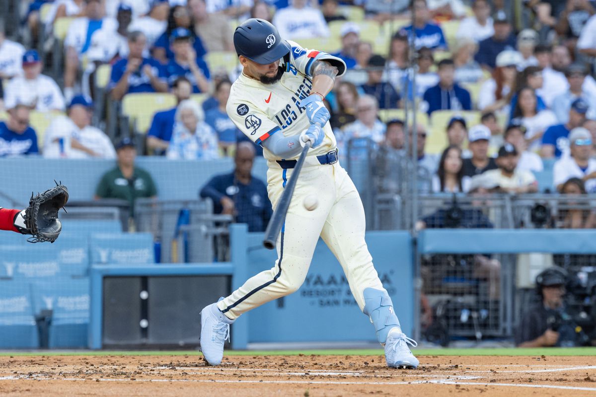 Andy Pages #44 of the Los Angeles Dodgers gets a hit during an MLB game against the Arizona Diamondbacks at Dodger Stadium on August 30, 2025 in Los Angeles, California.