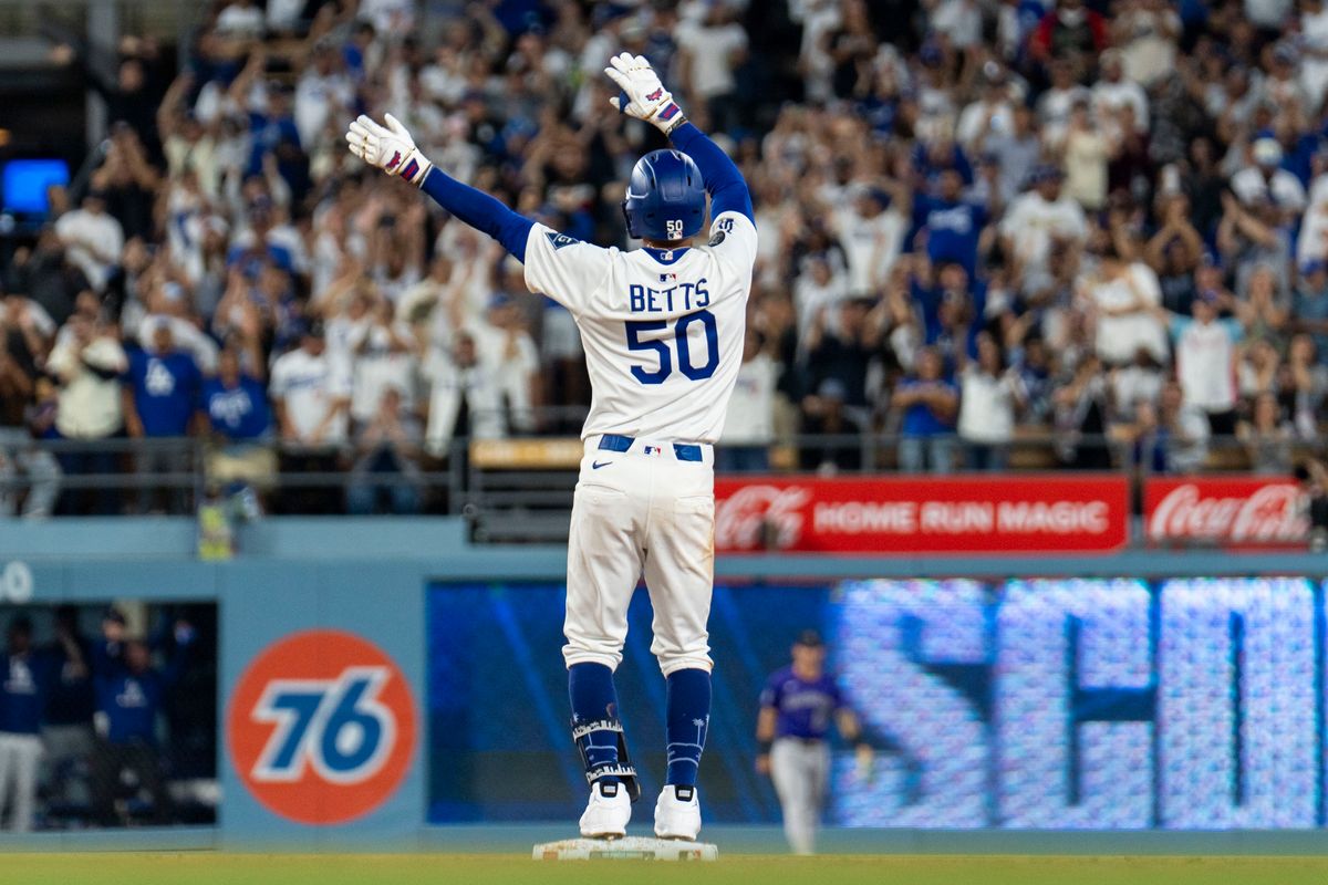 Los Angeles Dodgers infielder Mookie Betts (50) celebrates his double during an MLB baseball game against the Colorado Rockies, Wednesday September 10th, 2025 in Los Angeles, California. Los Angeles Dodgers infielder Mookie Betts (50) celebrates his double during an MLB baseball game against the Colorado Rockies, Wednesday September 10th, 2025 in Los Angeles, California.