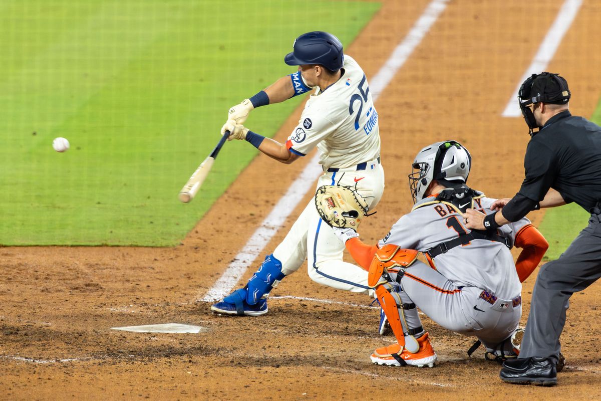 Tommy Edman #25 of the Los Angeles Dodgers squares up a pitch during an MLB game against the San Francisco Giants at Dodger Stadium on September 20, 2025 in Los Angeles, California. Tommy Edman #25 of the Los Angeles Dodgers squares up a pitch during an MLB game against the San Francisco Giants at Dodger Stadium on September 20, 2025 in Los Angeles, California.