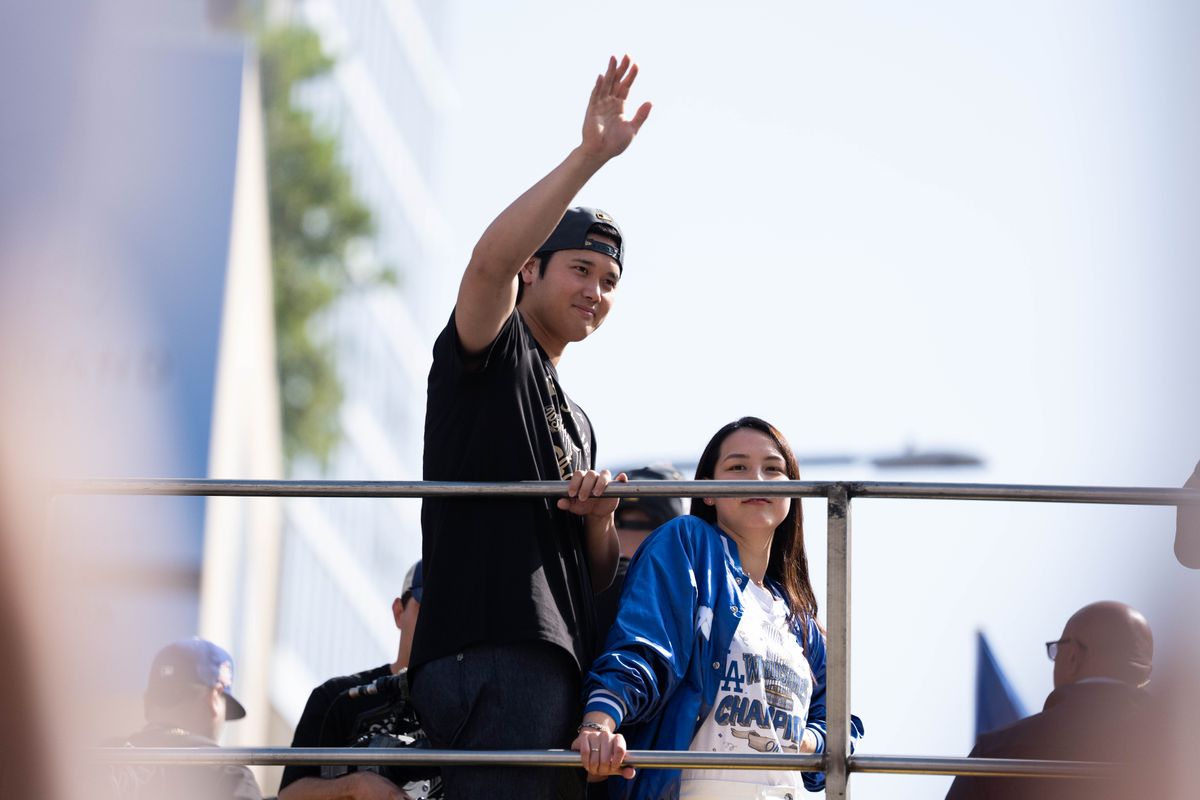 LOS ANGELES, Calif. — Nov. 3, 2025 — Dodgers star Shohei Ohtani waves to fans while passing by during the team’s championship parade on Monday. LOS ANGELES, Calif. — Nov. 3, 2025 — Dodgers star Shohei Ohtani waves to fans while passing by during the team’s championship parade on Monday.