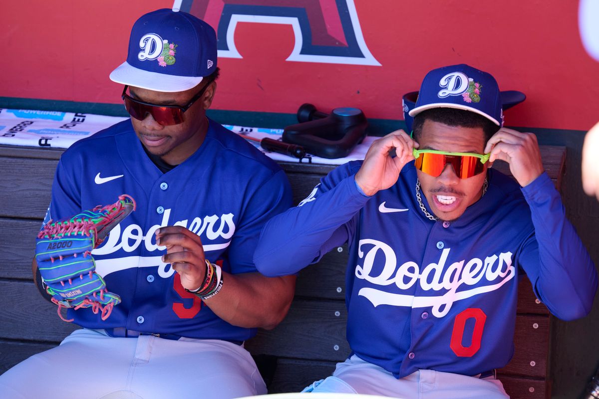 The Los Angeles Dodgers outfielder Zyhir Hope (94) and outfielder Kendall George (0) in the dugout against the Los Angeles Angels, February 21st, 2026 in Tempe Arizona. The Los Angeles Dodgers outfielder Zyhir Hope (94) and outfielder Kendall George (0) in the dugout against the Los Angeles Angels, February 21st, 2026 in Tempe Arizona.