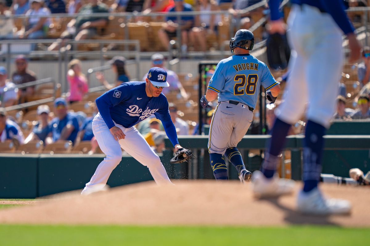 Los Angeles Dodgers first baseman Freddie Freeman (5) tagging first base for an out during an MLB spring training baseball game against the Milwaukee Brewers on March 16th, 2026 in Glendale, AZ.