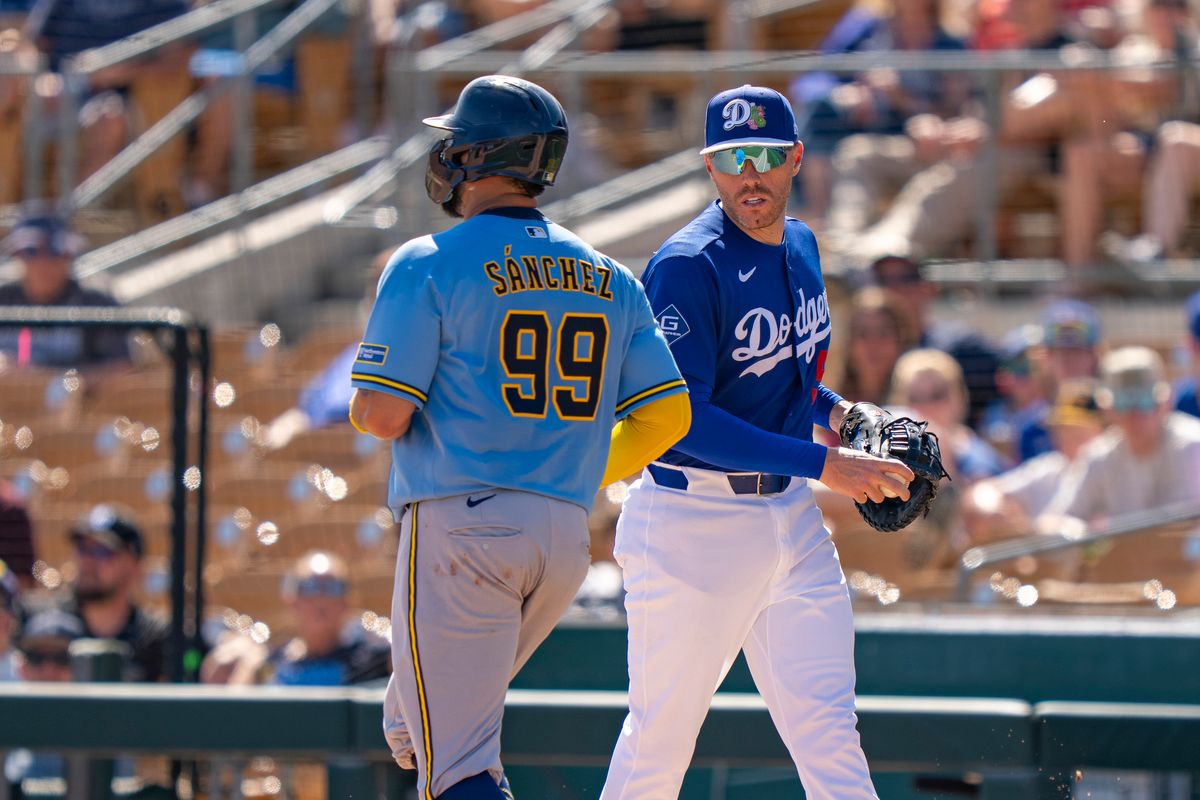 Los Angeles Dodgers first baseman Freddie Freeman (5) staring down Gary Sanchez during an MLB spring training baseball game against the Milwaukee Brewers on March 16th, 2026 in Glendale, AZ.