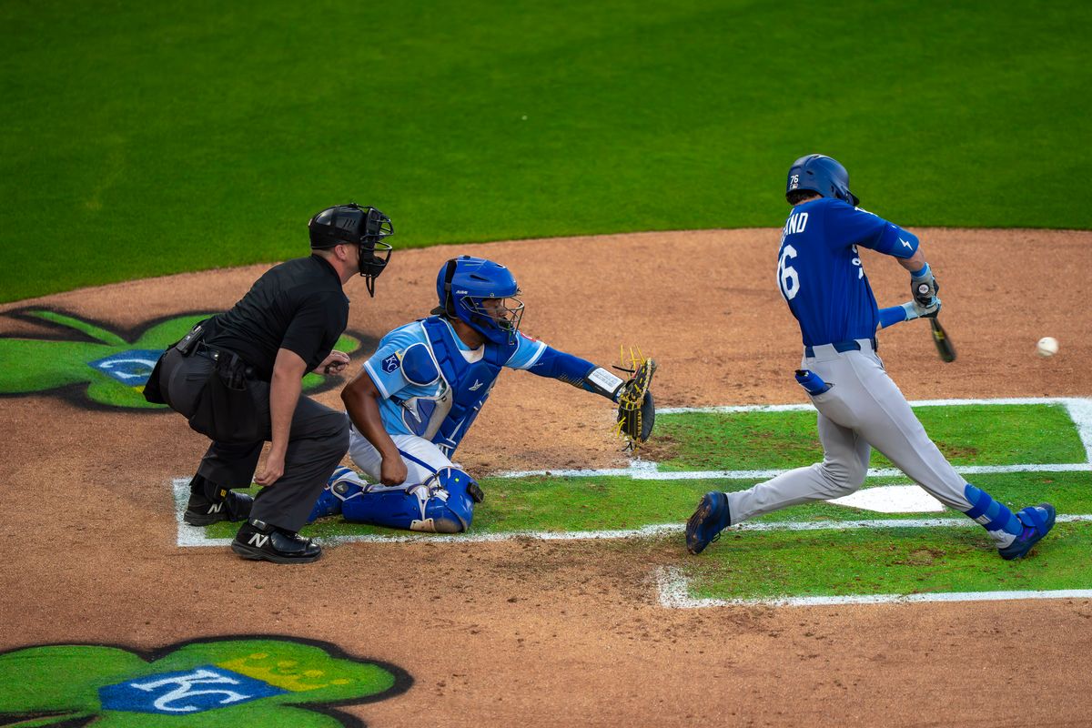 Los Angeles Dodgers infielder Alex Freeland (76) hitting a foul during an MLB spring training baseball game against the Kansas City Royals on March 17th, 2026 in Surprise, AZ.