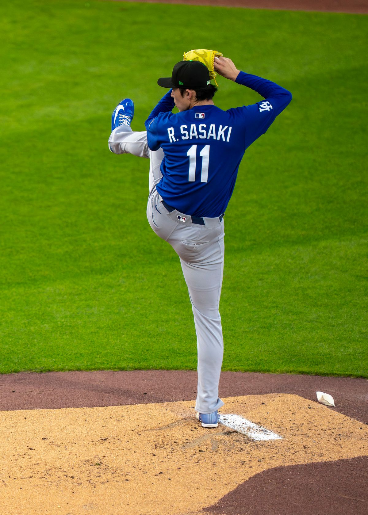 Los Angeles Dodgers pitcher Roki Sasaki (11) pitching during an MLB spring training baseball game against the Kansas City Royals on March 17th, 2026 in Surprise, AZ.