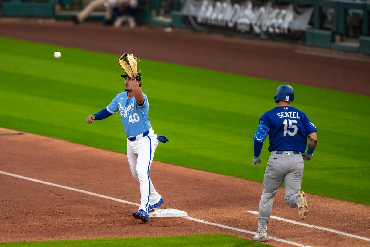 Kansas City Royals first baseman Josh Rojas (40) tagging first while catching the ball during an MLB spring training baseball game against the Los Angeles Dodgers on March 17th, 2026 in Surprise, AZ.