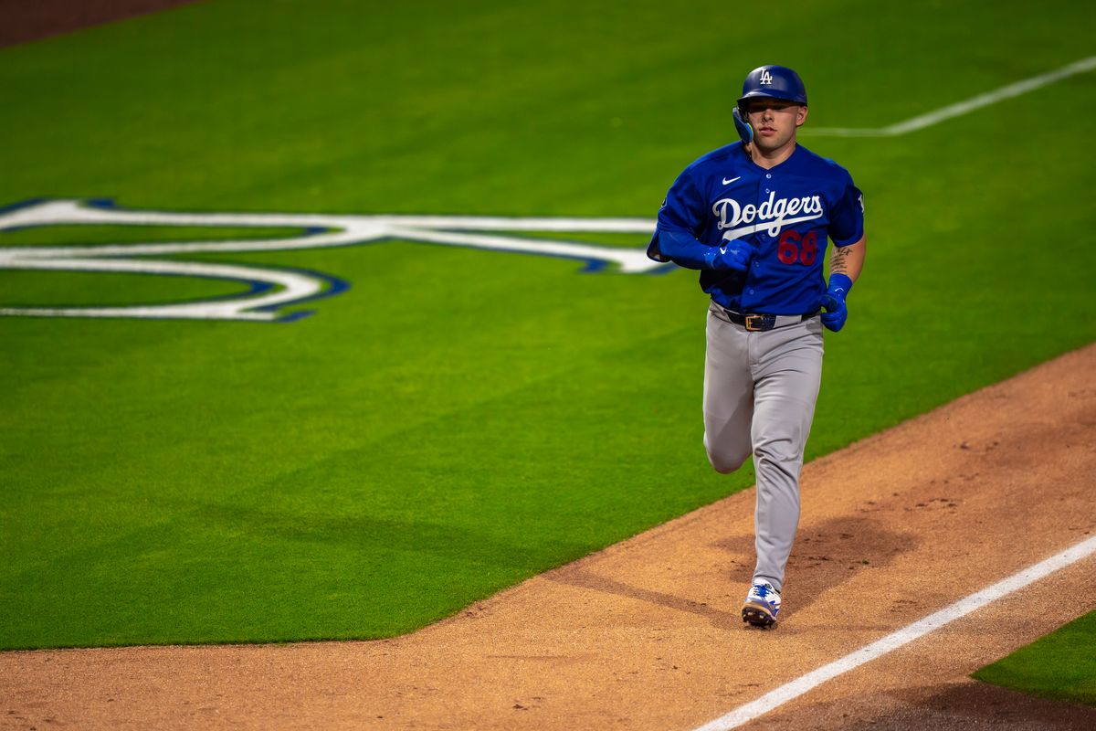 Los Angeles Dodgers catcher Dalton Rushing (68) runs the bases after hitting a homerun during an MLB spring training baseball game against the Kansas City Royals on March 17th, 2026 in Surprise, AZ.