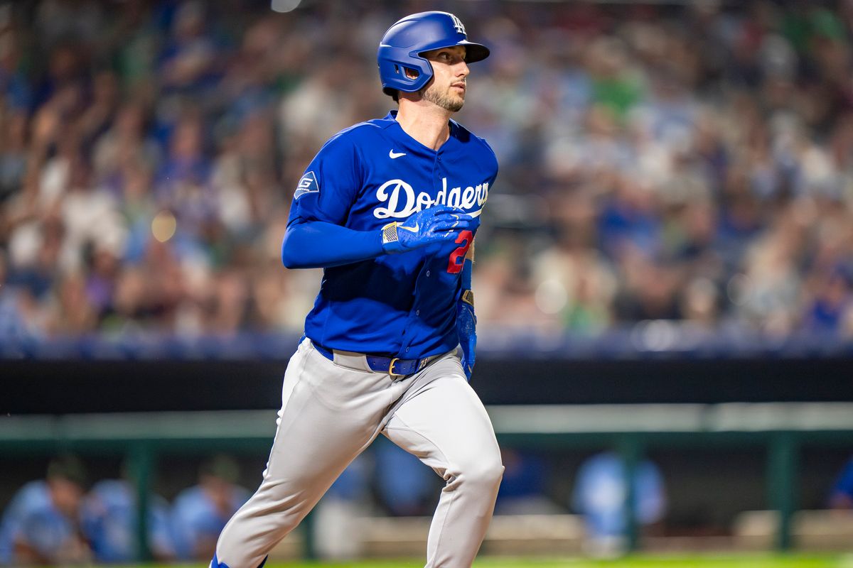 Los Angeles Dodgers outfielder Kyle Tucker (23) running to first during a ground out during an MLB spring training baseball game against the Kansas City Royals on March 17th, 2026 in Surprise, AZ.