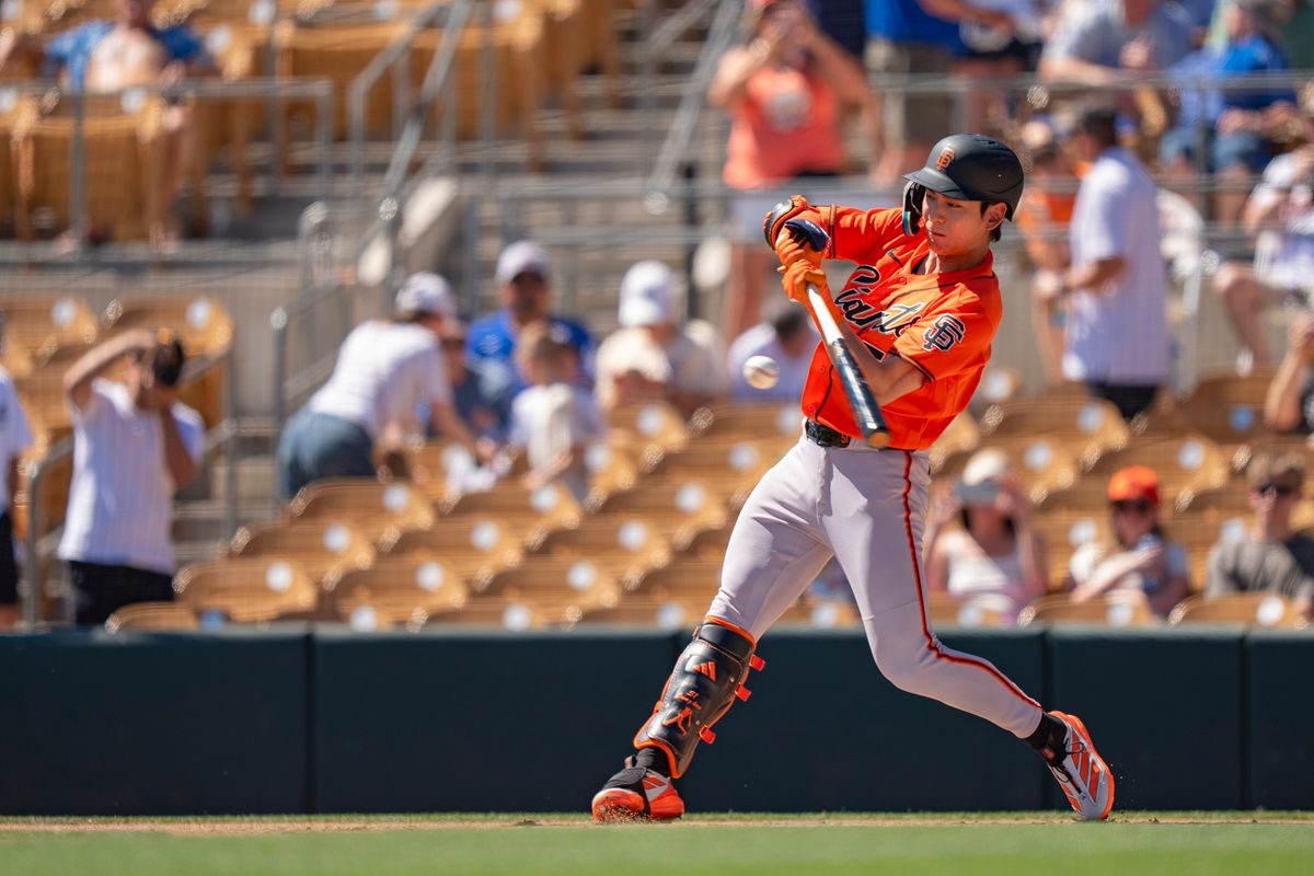 San Francisco Giants outfielder Jung Hoo Lee (51) hitting a ground ball during an MLB spring training baseball game against the Los Angeles Dodgers on March 18th, 2026 in Glendale, AZ.