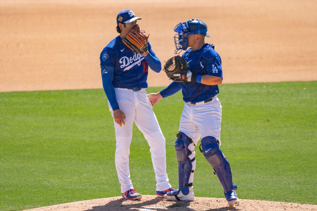 Los Angeles Dodgers pitcher Shohei Ohtani (17) conferring with catcher Dalton Rushing during an MLB spring training baseball game against the San Fransisco Giants on March 18th, 2026 in Glendale, AZ.