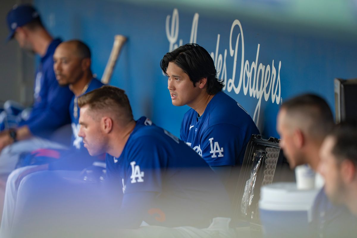 Los Angeles Dodgers pitcher Shohei Ohtani (17) relaxing in the dugout during an MLB spring training baseball game against the San Diego Padres on March 20th, 2026 in Glendale, AZ. Los Angeles Dodgers pitcher Shohei Ohtani (17) relaxing in the dugout during an MLB spring training baseball game against the San Diego Padres on March 20th, 2026 in Glendale, AZ.