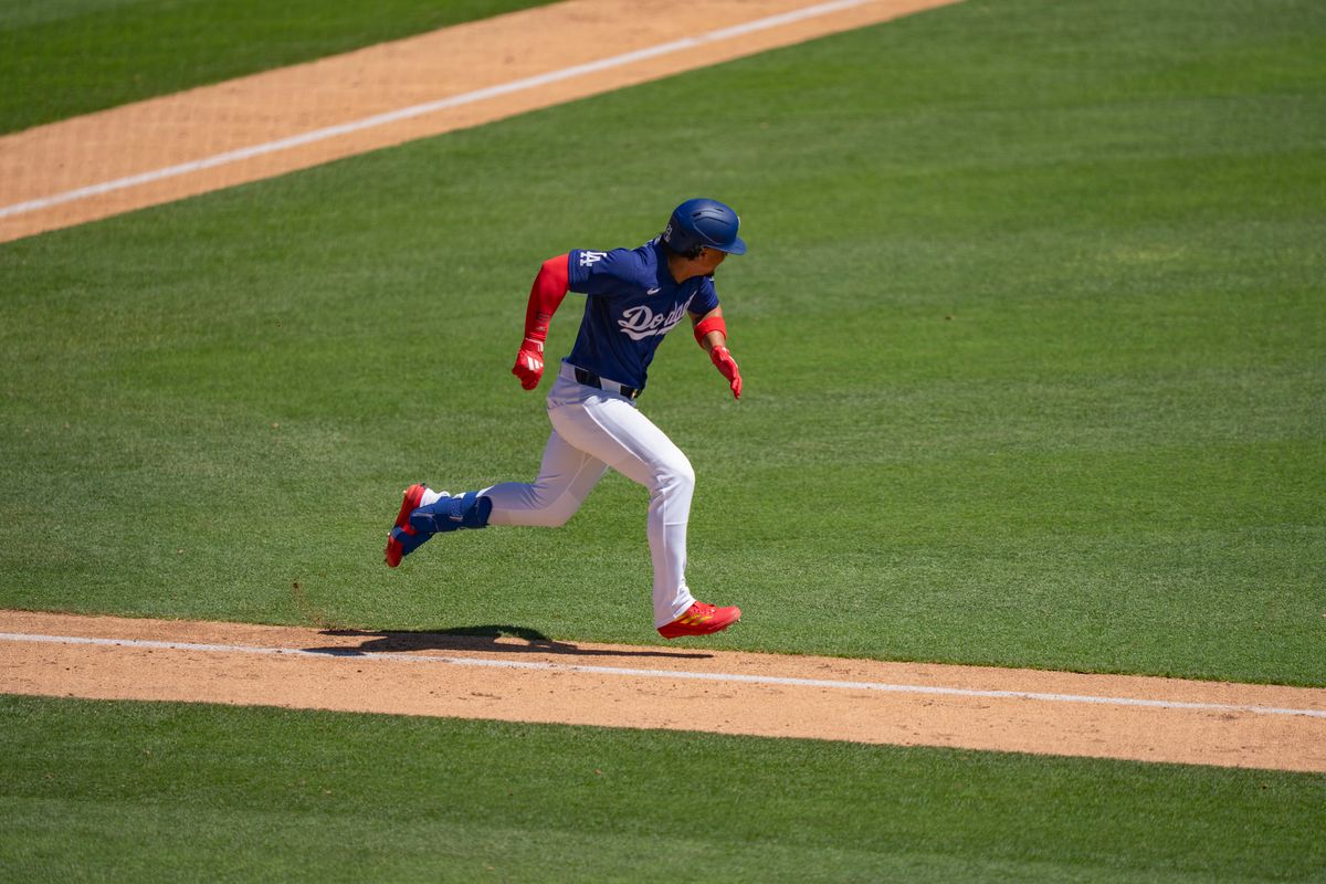 Los Angeles Dodgers first baseman Santiago Espinal (21) running to first base during an MLB spring training baseball game against the Las Vegas A’s on March 21st, 2026 in Glendale, AZ. Los Angeles Dodgers first baseman Santiago Espinal (21) running to first base during an MLB spring training baseball game against the Las Vegas A’s on March 21st, 2026 in Glendale, AZ.