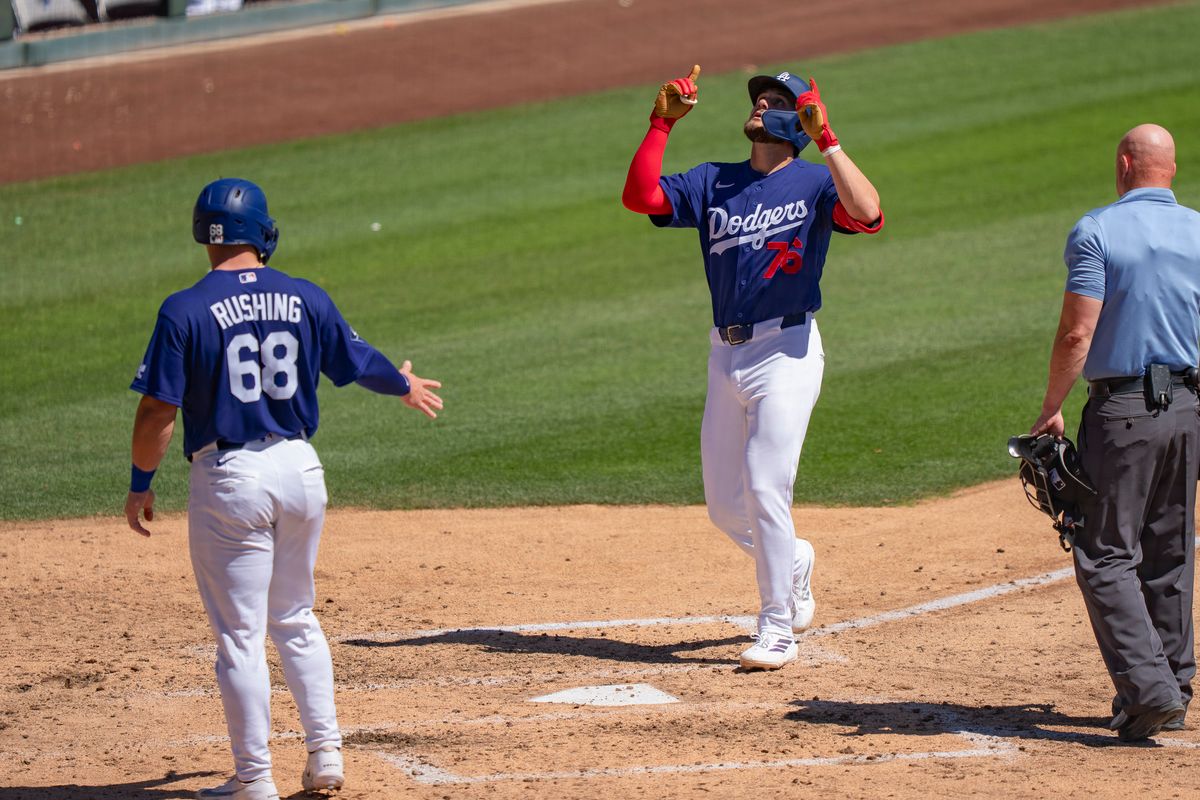 Los Angeles Dodgers second baseman Alex Freeland (76) celebrating a home run during an MLB spring training baseball game against the Las Vegas A’s on March 21st, 2026 in Glendale, AZ. Los Angeles Dodgers second baseman Alex Freeland (76) celebrating a home run during an MLB spring training baseball game against the Las Vegas A’s on March 21st, 2026 in Glendale, AZ.