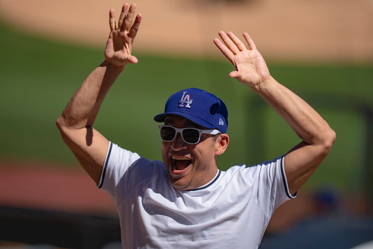 Los Angeles Dodgers fan celebrating a double during an MLB spring training baseball game against the Las Vegas A’s on March 21st, 2026 in Glendale, AZ. Los Angeles Dodgers fan celebrating a double during an MLB spring training baseball game against the Las Vegas A’s on March 21st, 2026 in Glendale, AZ.