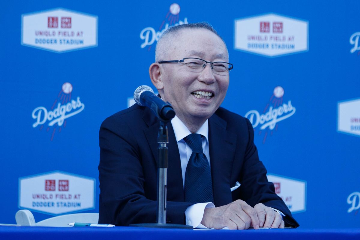 UNQILO founder Tadashi Yanai laughs during a UNIQLO partnership press conference on March 25, 2026 in Los Angeles, California.