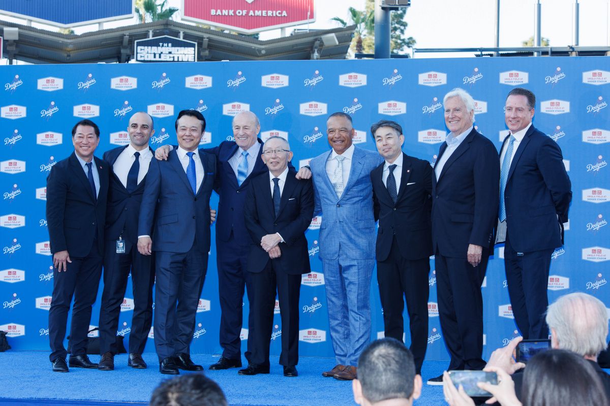 Representatives from UNIQLO and the Los Angeles Dodgers take a picture together during a UNIQLO partnership press conference on March 25, 2026 in Los Angeles, California.